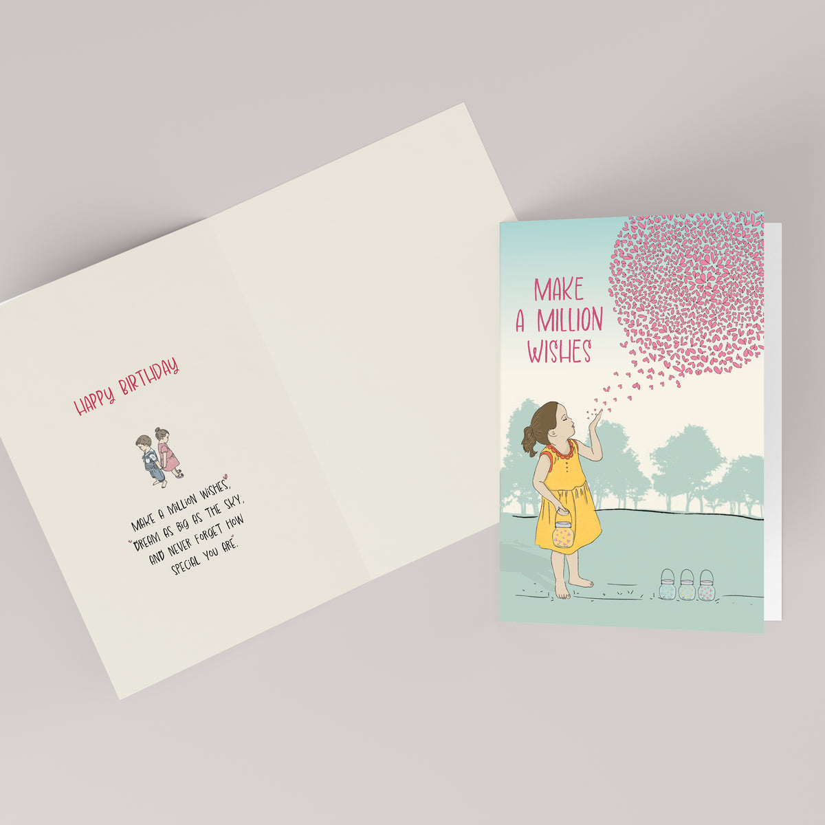 Make a Million Wishes birthday card shown open — inside reads Happy Birthday, make a million wishes, dream as big as the sky, and never forget how special you are